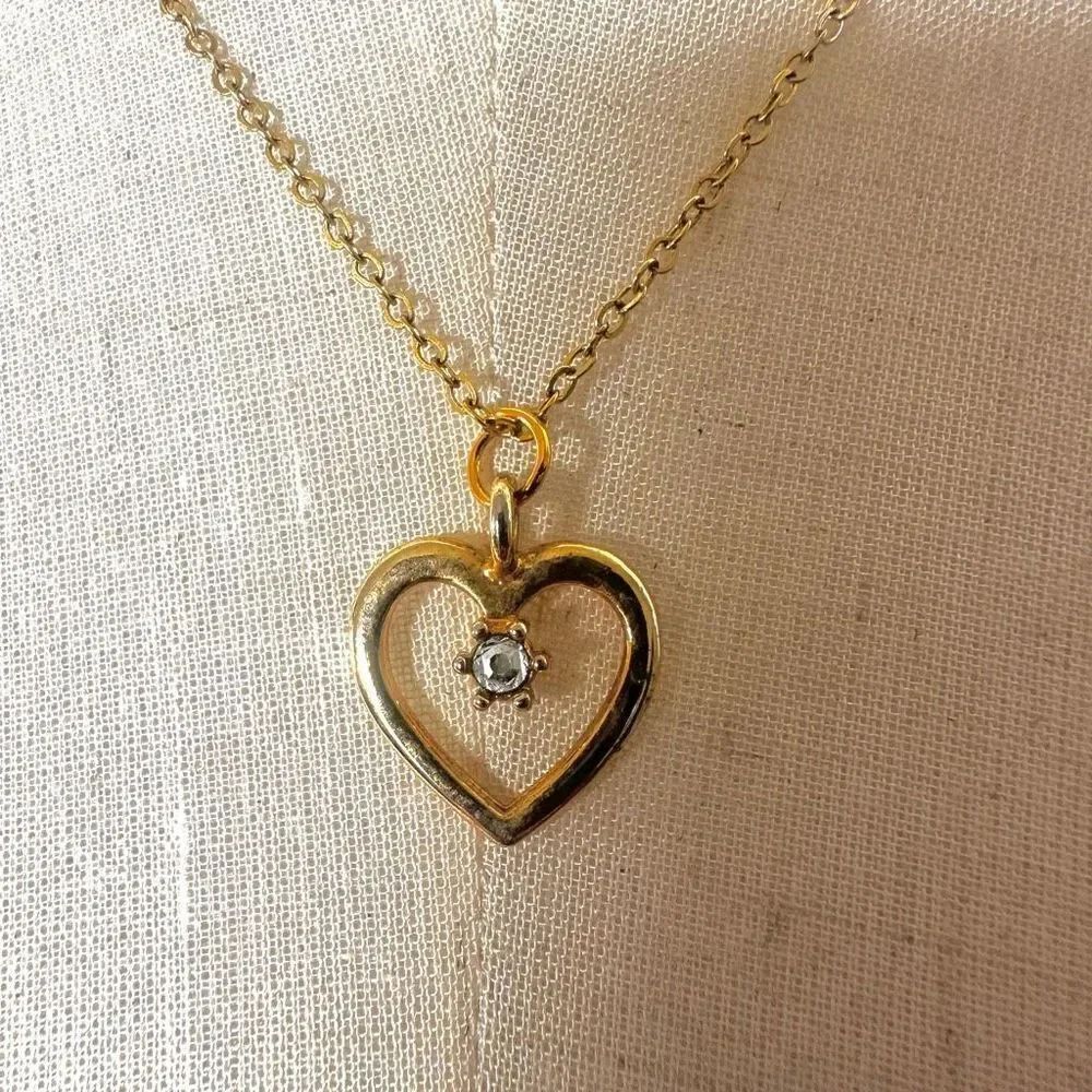 Gold tone heart rhinestone pendant necklace